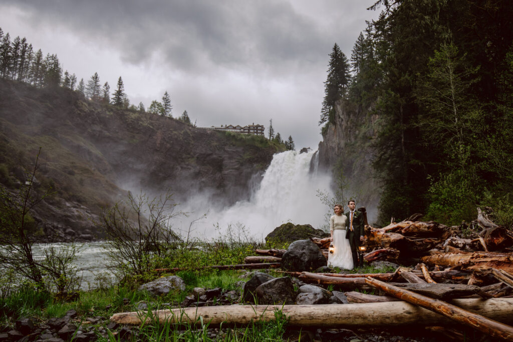 Waterfalls in the spring in the PNW can be a beautiful and dramatic backdrop for an elopement.